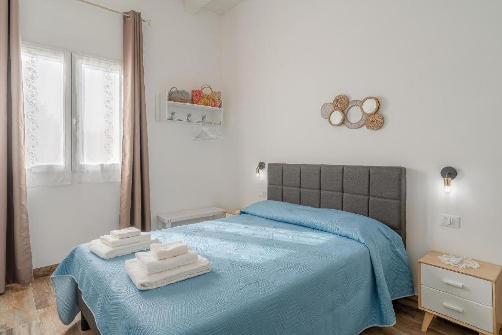 Postel nebo postele na pokoji v ubytování Agri Lemon Green Case vacanze