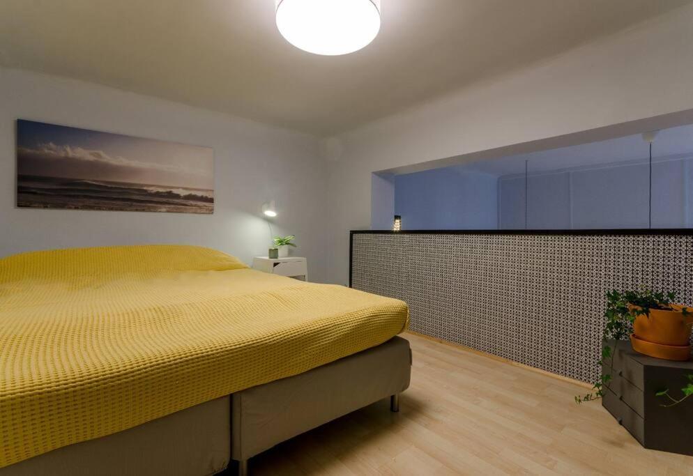Postel nebo postele na pokoji v ubytování Super Central Apartment