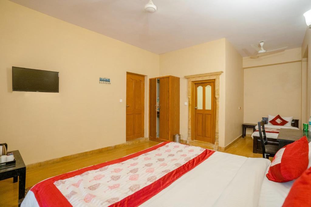 Postel nebo postele na pokoji v ubytování Naman Haveli-Boutique Stay For Budget Travllers