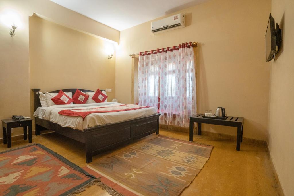 Postel nebo postele na pokoji v ubytování Naman Haveli-Boutique Stay For Budget Travllers