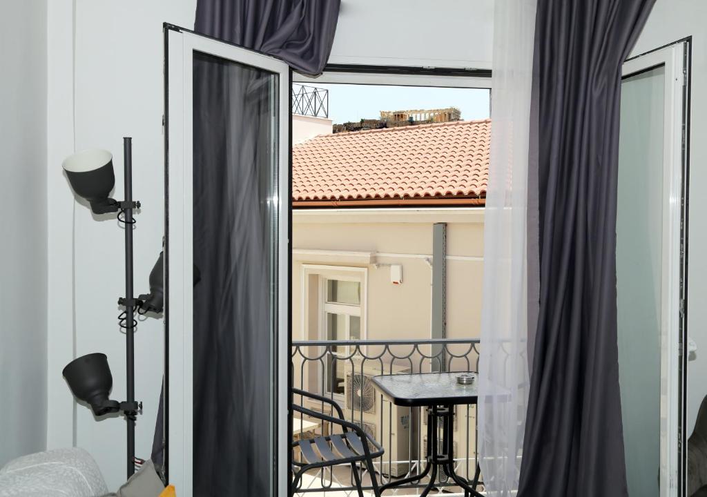 Balkón alebo terasa v ubytovaní Monastiraki Sweet House 2