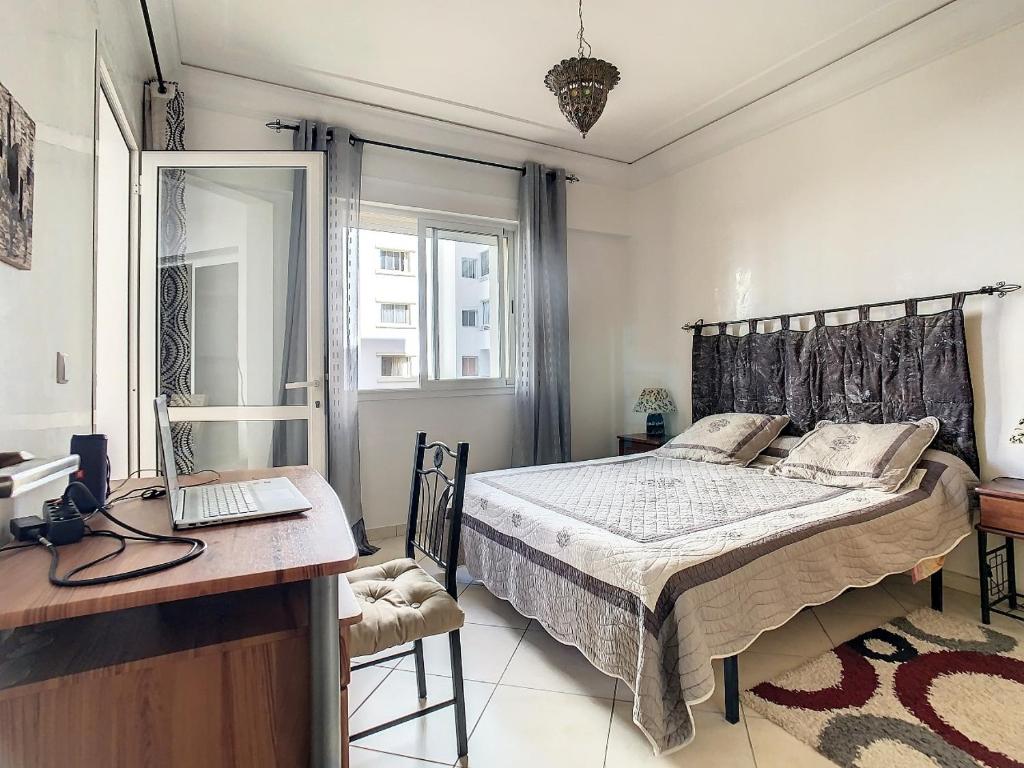 Ένα ή περισσότερα κρεβάτια σε δωμάτιο στο Quiet, central apartment with loggie