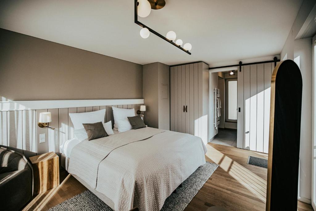 Postel nebo postele na pokoji v ubytování Landgasthof Jagstmühle