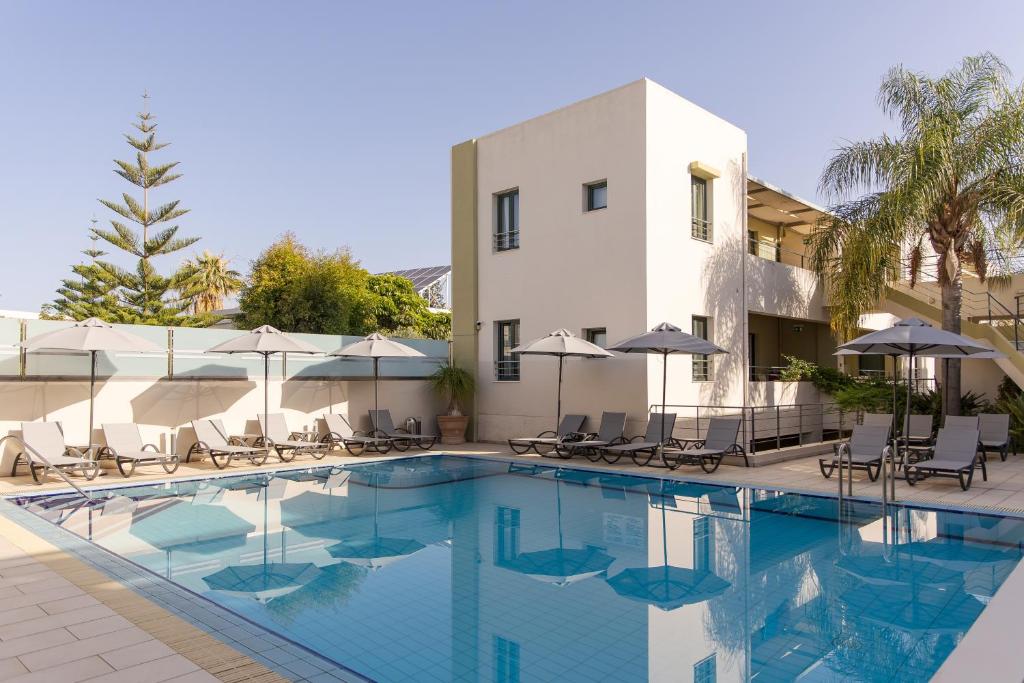 The swimming pool at or close to Athina Beach Hotel