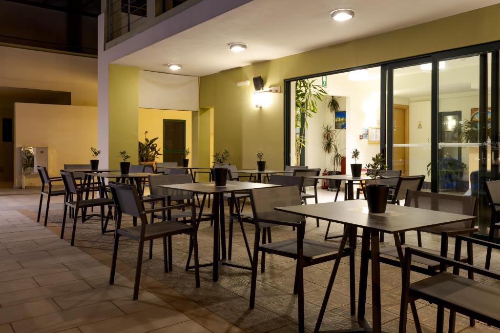 A restaurant or other place to eat at Athina Beach Hotel
