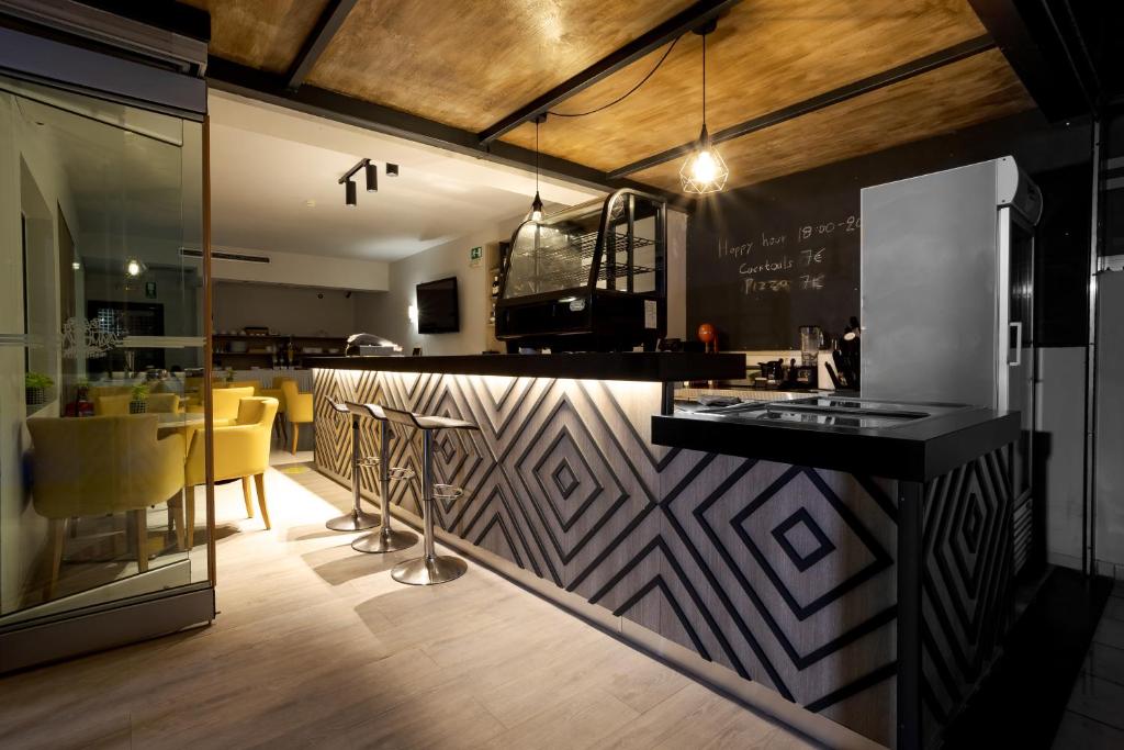 A kitchen or kitchenette at Athina Beach Hotel