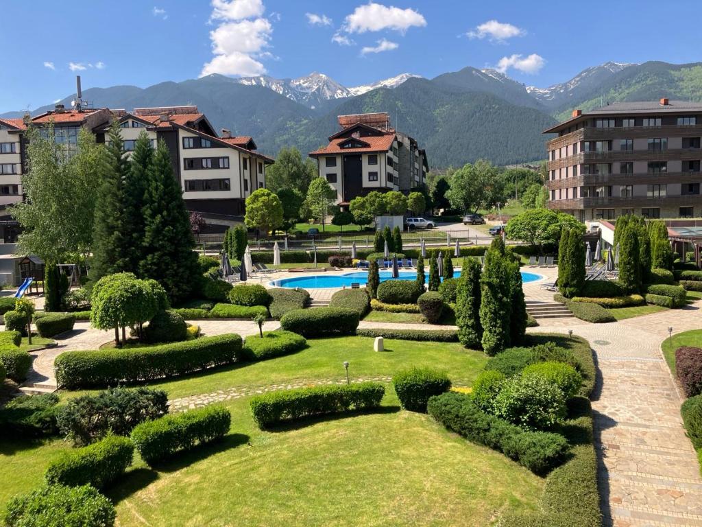 a view of a park with trees and bushes at PARADISE RELAX APARTMENT in Bansko