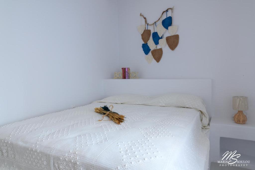 Postel nebo postele na pokoji v ubytování Siridaki Homes Leros
