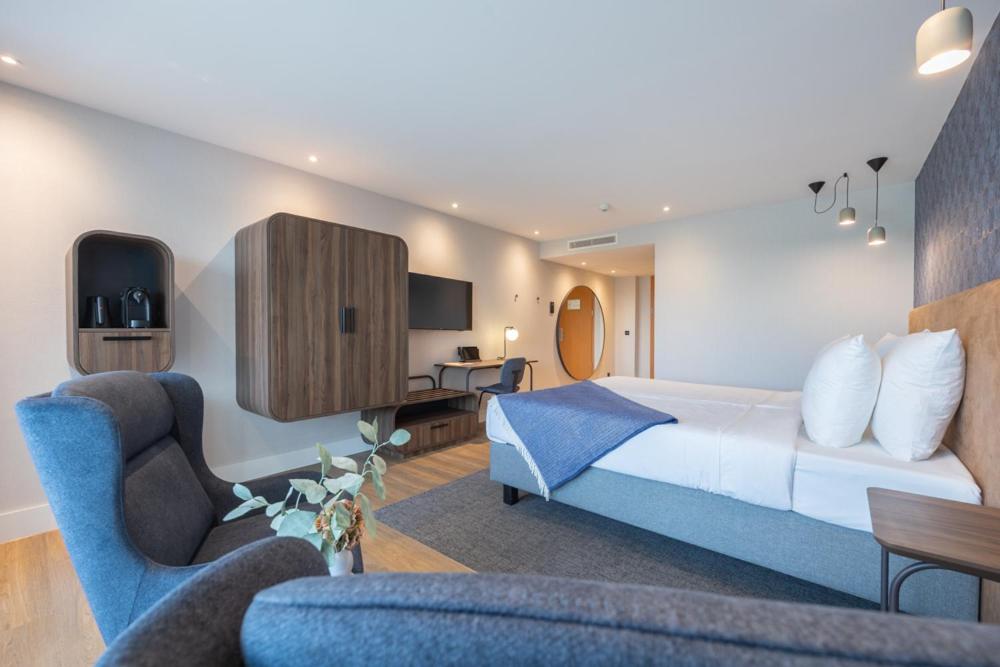 Posezení v ubytování Van der Valk Hotel Melle - Osnabrück