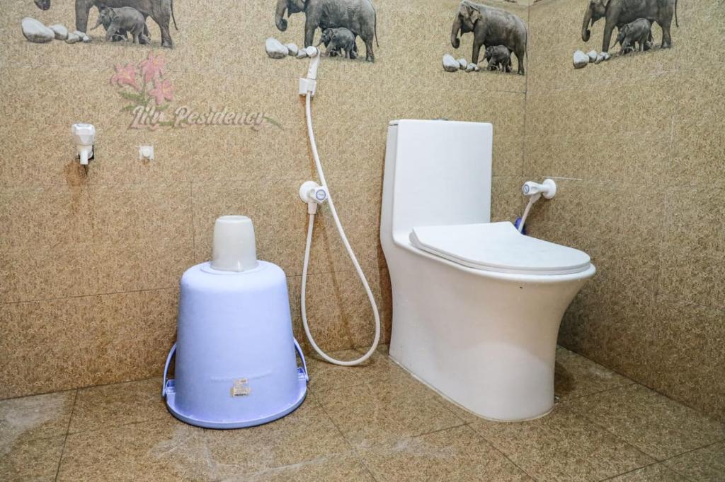Koupelna v ubytování Lily Homestay