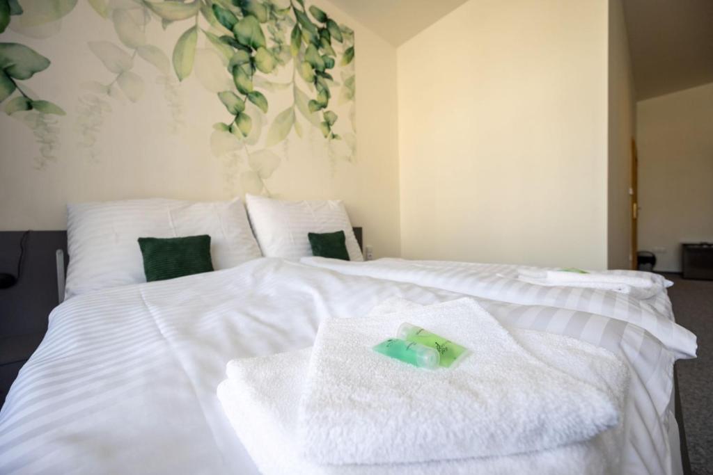 Voodi või voodid majutusasutuse Hotel THT toas