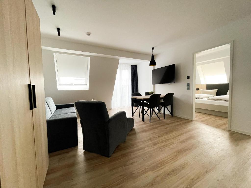 TV a/nebo společenská místnost v ubytování HOLI City Apart Hotel Berlin