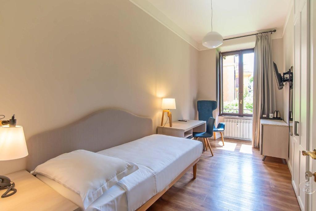Voodi või voodid majutusasutuse HOTEL DELLE CIVETTE toas