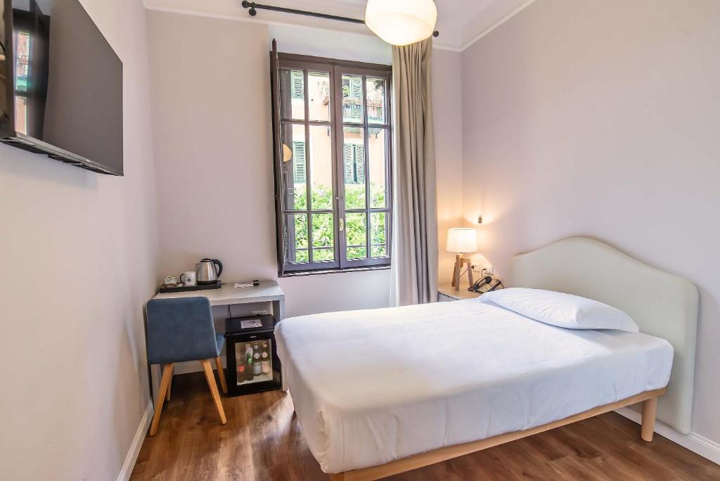 Voodi või voodid majutusasutuse HOTEL DELLE CIVETTE toas