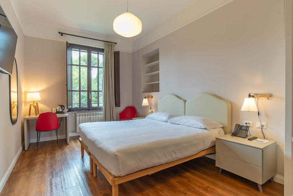 Voodi või voodid majutusasutuse HOTEL DELLE CIVETTE toas