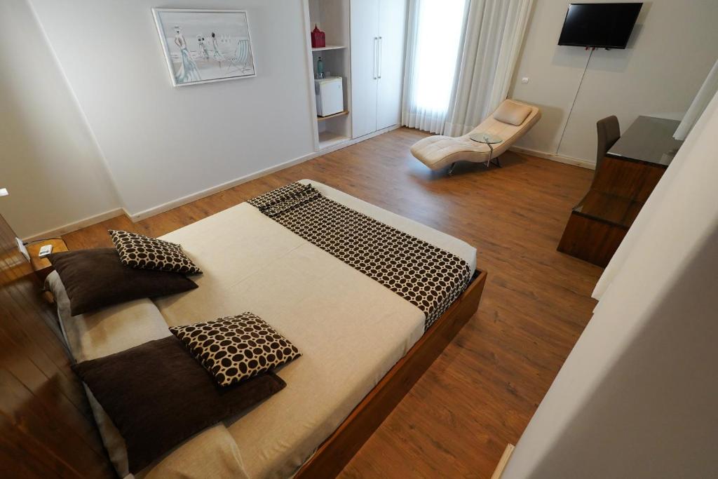 Televízia a/alebo spoločenská miestnosť v ubytovaní Hotel Mas Prades