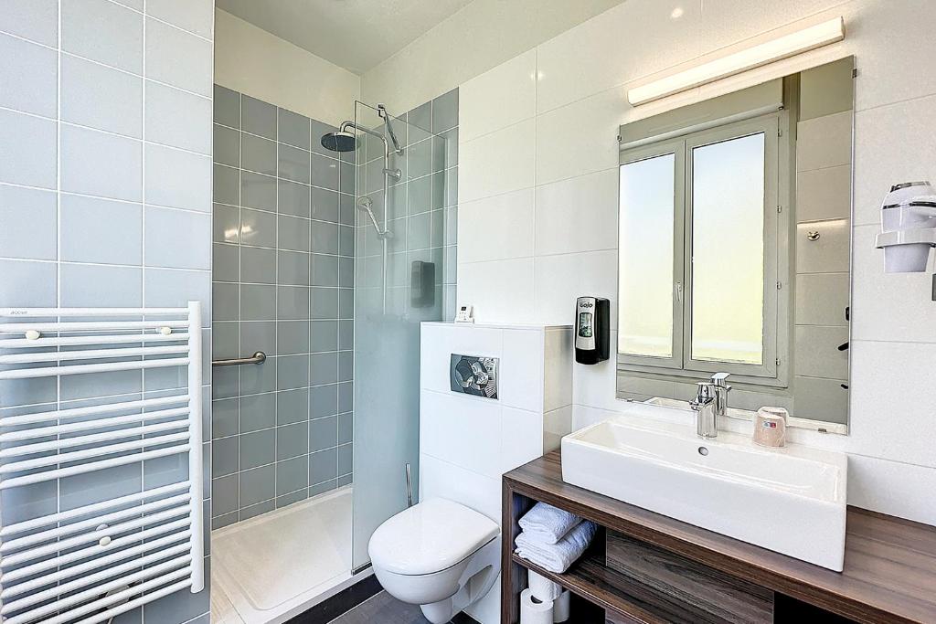 Un baño de Hôtellerie L'Enclos Rey