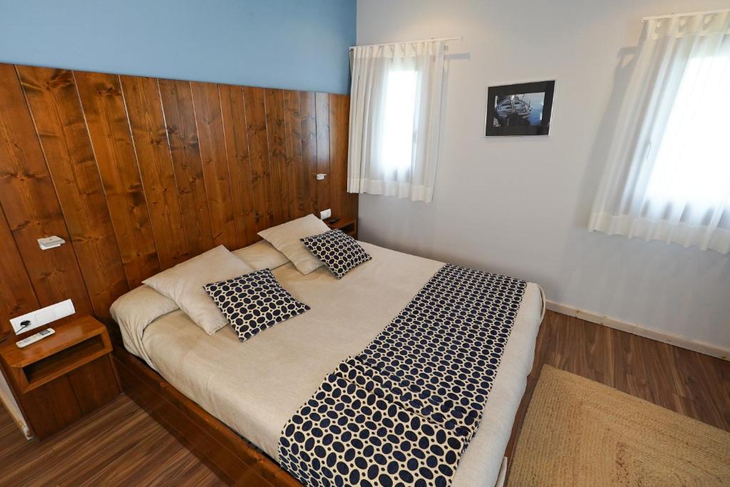 Posteľ alebo postele v izbe v ubytovaní Hotel Mas Prades