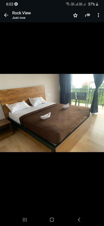 Postel nebo postele na pokoji v ubytování Rock View Resort