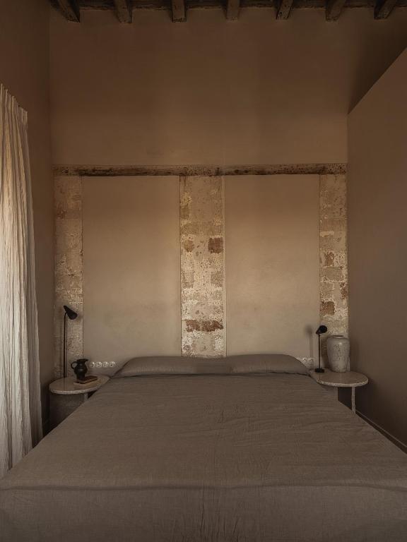 Postel nebo postele na pokoji v ubytování Aisha Hotel