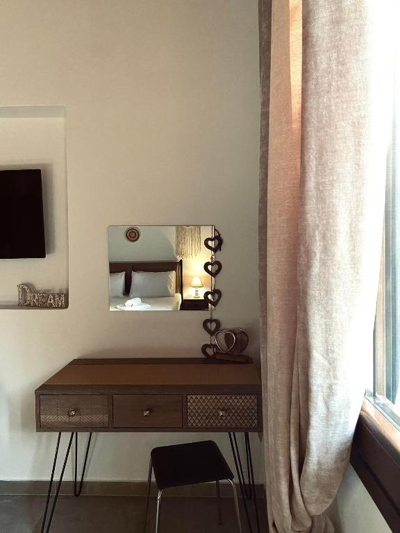 TV a/nebo společenská místnost v ubytování Moxy Paxos - Cozy Home