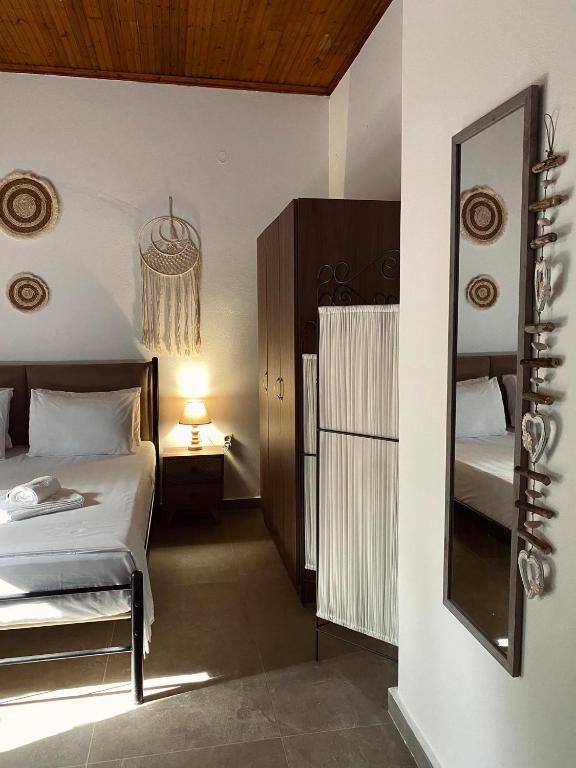 Postel nebo postele na pokoji v ubytování Moxy Paxos - Cozy Home