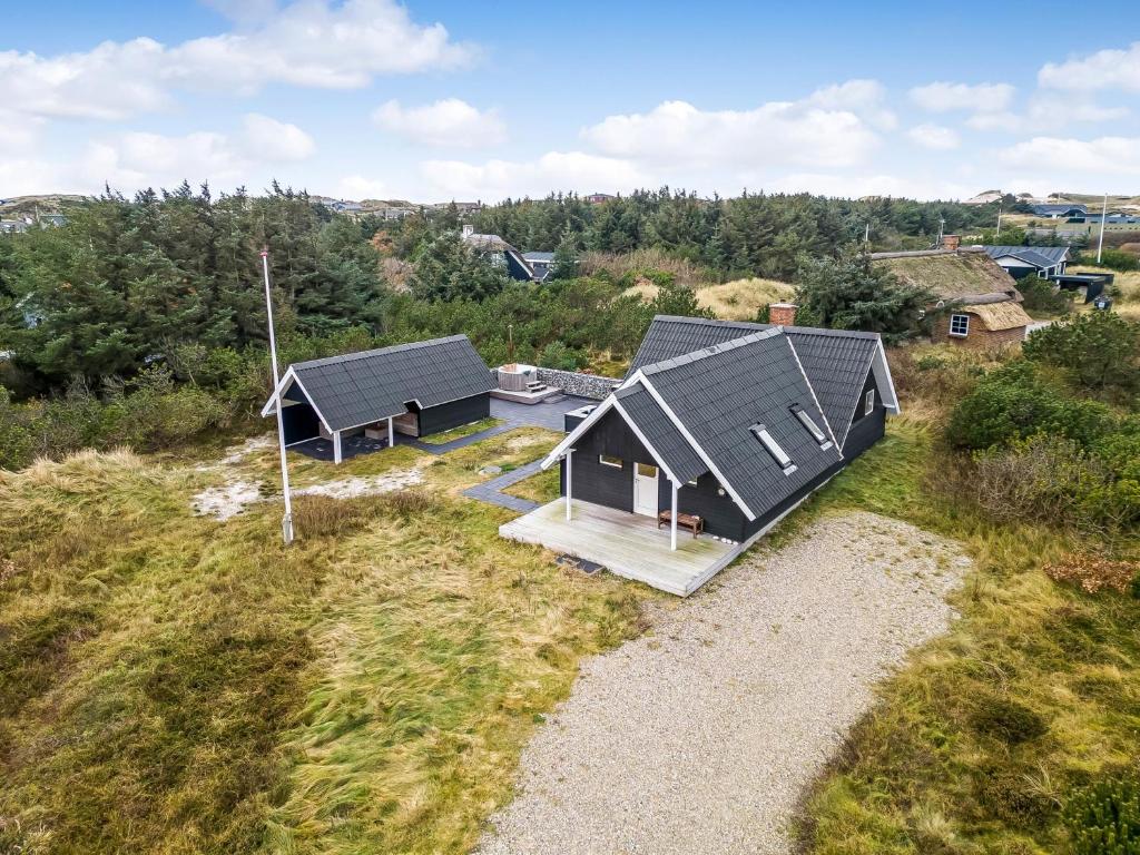 an overhead view of a house in a field at Vacation Home Renovated In 2023 With A 6-Person Hot Tub - 1010 in Ringkøbing