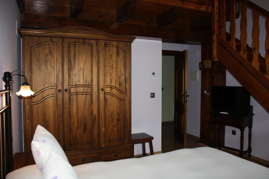Postel nebo postele na pokoji v ubytování Hotel Casa Arcas