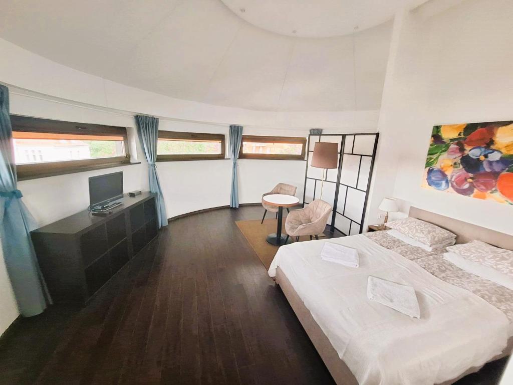 Posteľ alebo postele v izbe v ubytovaní B & B Tomula