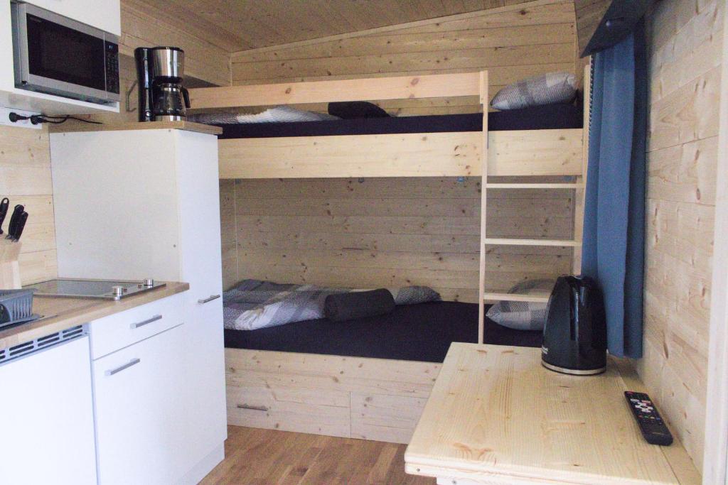 Kuchyň nebo kuchyňský kout v ubytování Wooden Dream