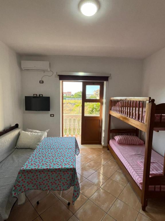 Postel nebo postele na pokoji v ubytování Residence Domus Aurea
