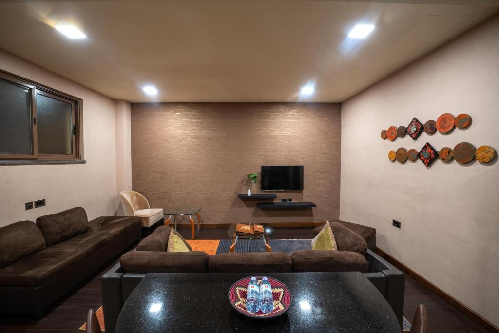 Speke Apartments Wampewoにあるテレビまたはエンターテインメントセンター