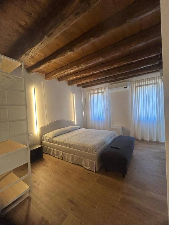 Ένα ή περισσότερα κρεβάτια σε δωμάτιο στο Casa Milena