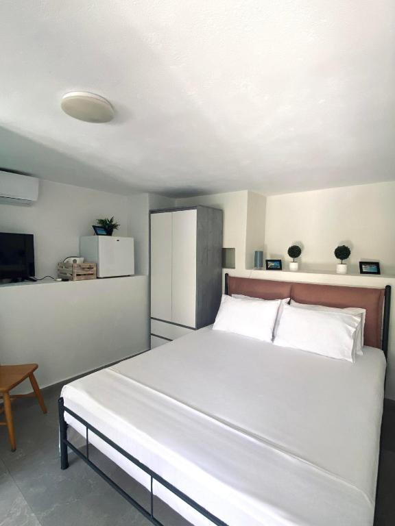 Kuchyň nebo kuchyňský kout v ubytování Moxy Paxos Apartments