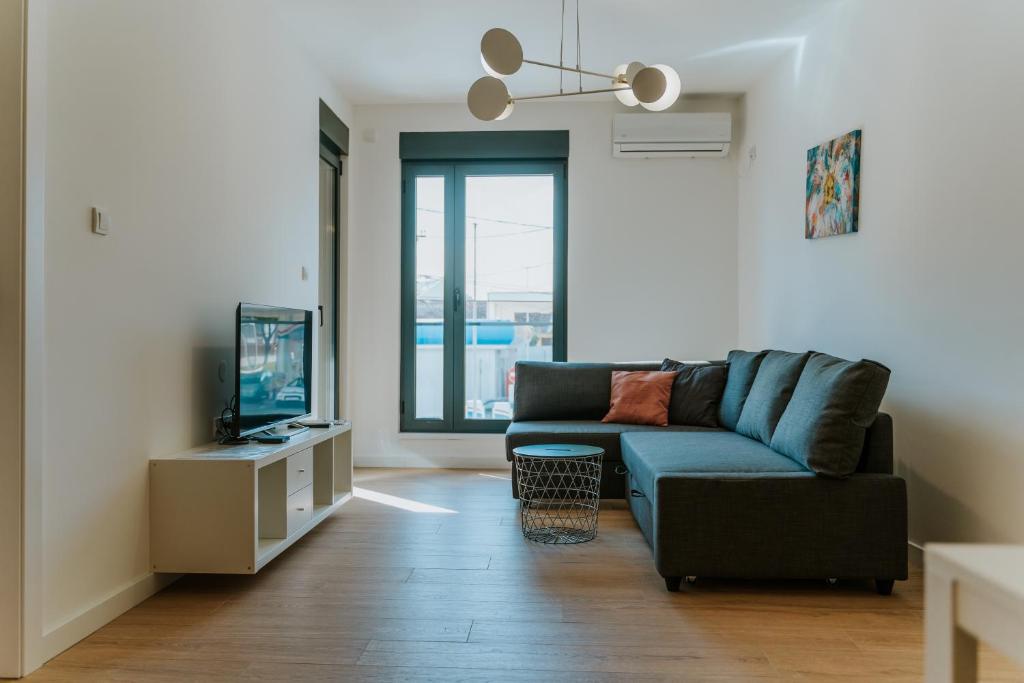 Televiisor ja/või meelelahutuskeskus majutusasutuses Apartmani Laketić