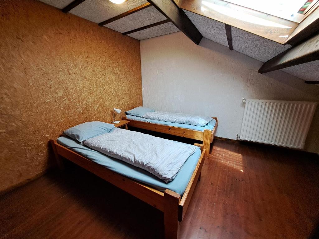 Postel nebo postele na pokoji v ubytování Gîte Filly 4C - 14 pers.