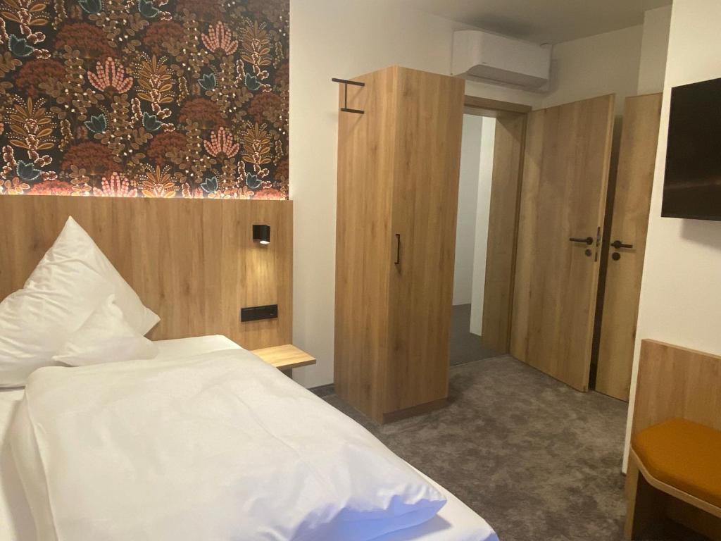 Postel nebo postele na pokoji v ubytování Akzent Hotel Schranne
