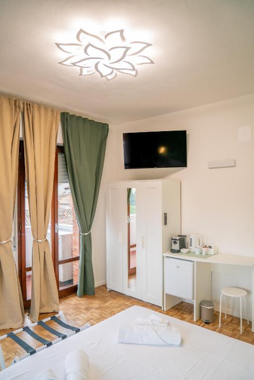 Postel nebo postele na pokoji v ubytování Vento del Conero