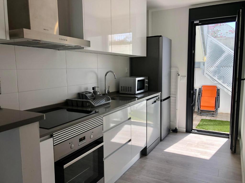 Kuchyň nebo kuchyňský kout v ubytování Villa Oso