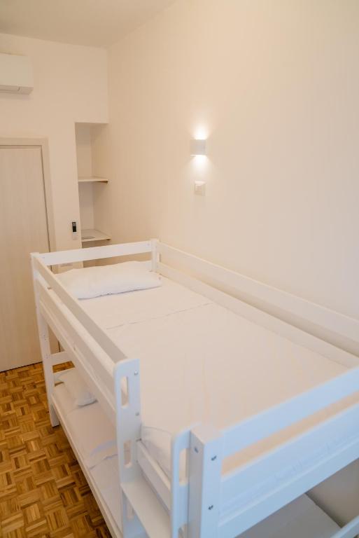 Postel nebo postele na pokoji v ubytování Vento del Conero