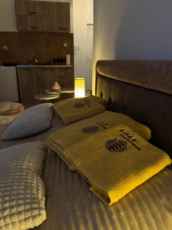 Postel nebo postele na pokoji v ubytování Loli apartman 2