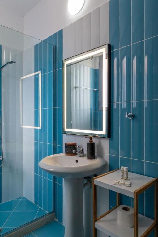 Koupelna v ubytování Altobelo Hotel