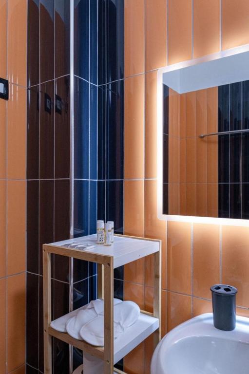 Koupelna v ubytování Altobelo Hotel