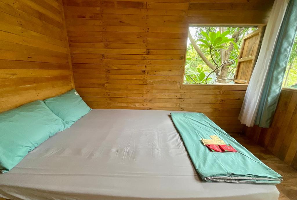 Postel nebo postele na pokoji v ubytování Mèo Home - Bụi Homestay