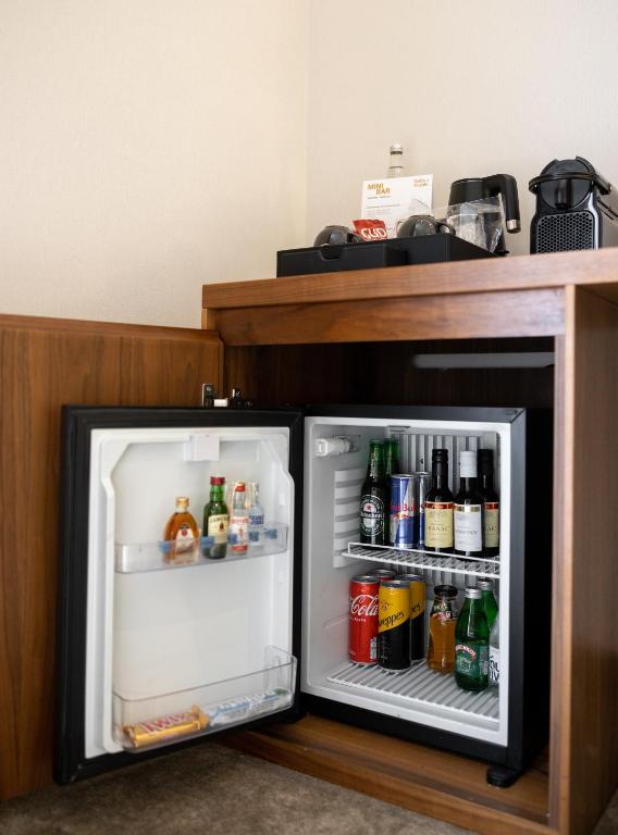 Nápoje v ubytování Maison Royale