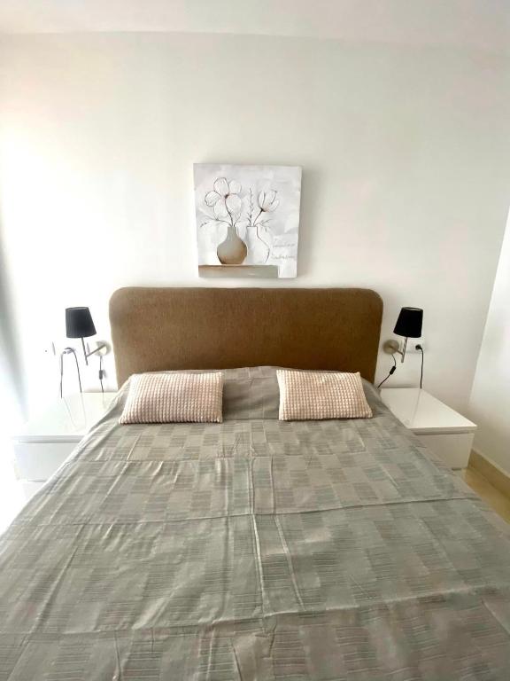 Postel nebo postele na pokoji v ubytování Residencia Lucia