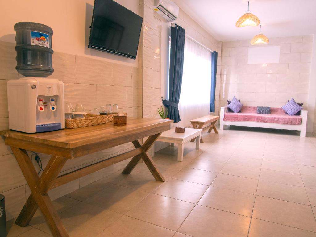 TV a/nebo společenská místnost v ubytování CoCo Breeze Spa Hotel