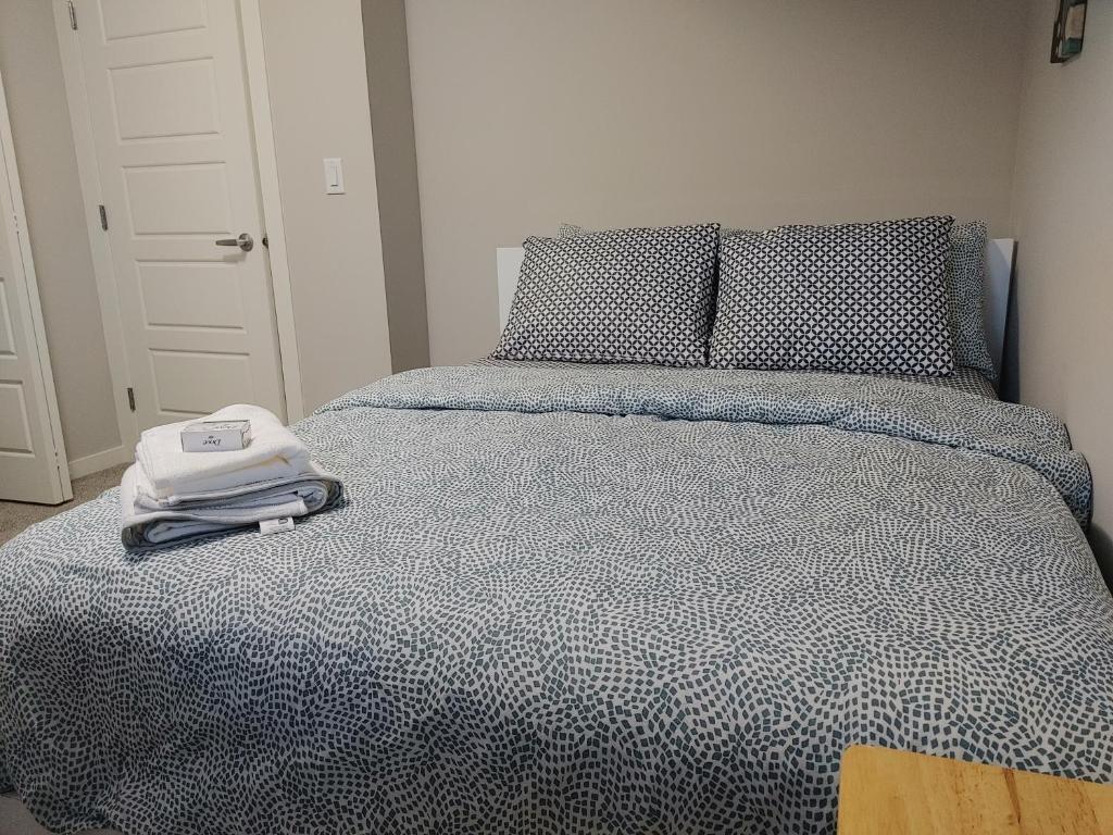Postel nebo postele na pokoji v ubytování Genesis Townhouse