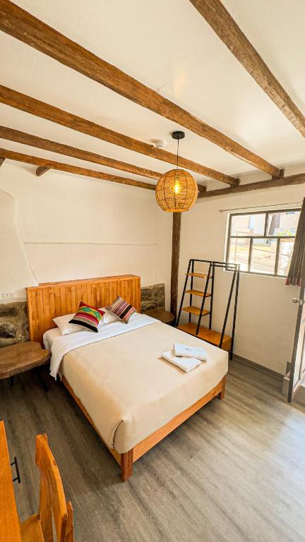Letto o letti in una camera di Black Llama Hostel Cusco