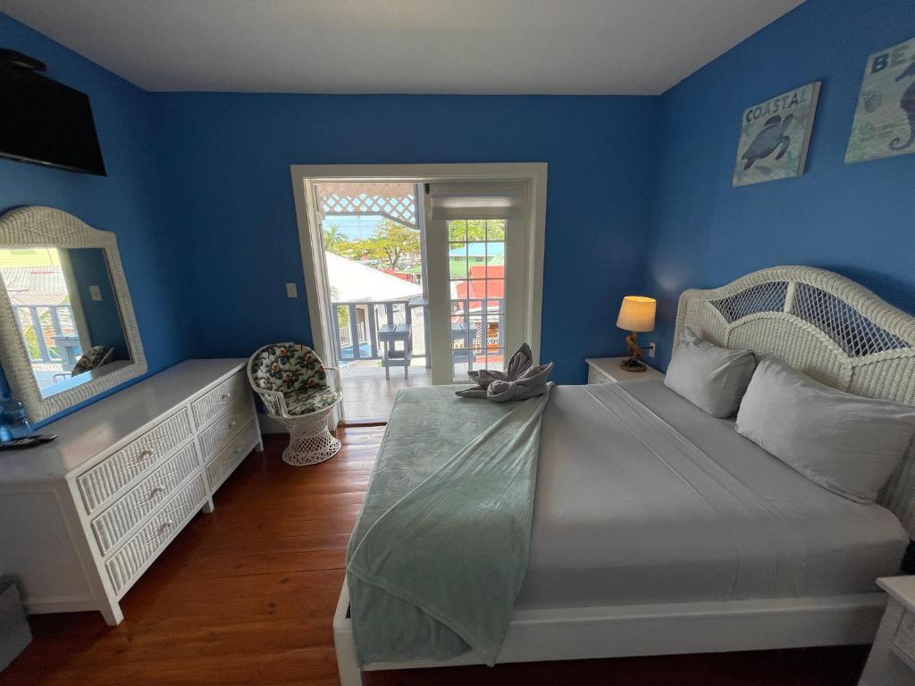 Uma cama ou camas num quarto em Hotel Bocas Town
